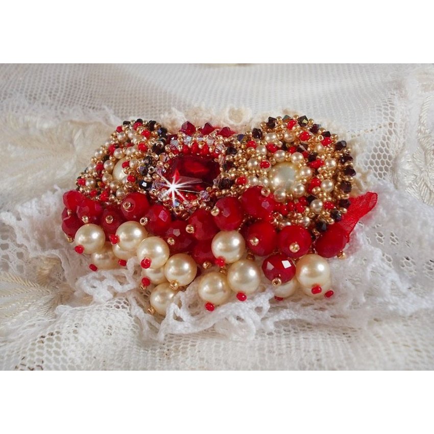 Ruby brooch embroidered with a 1960's bohemian glass cabochon, pearls, Swarovski crystals and seed beads