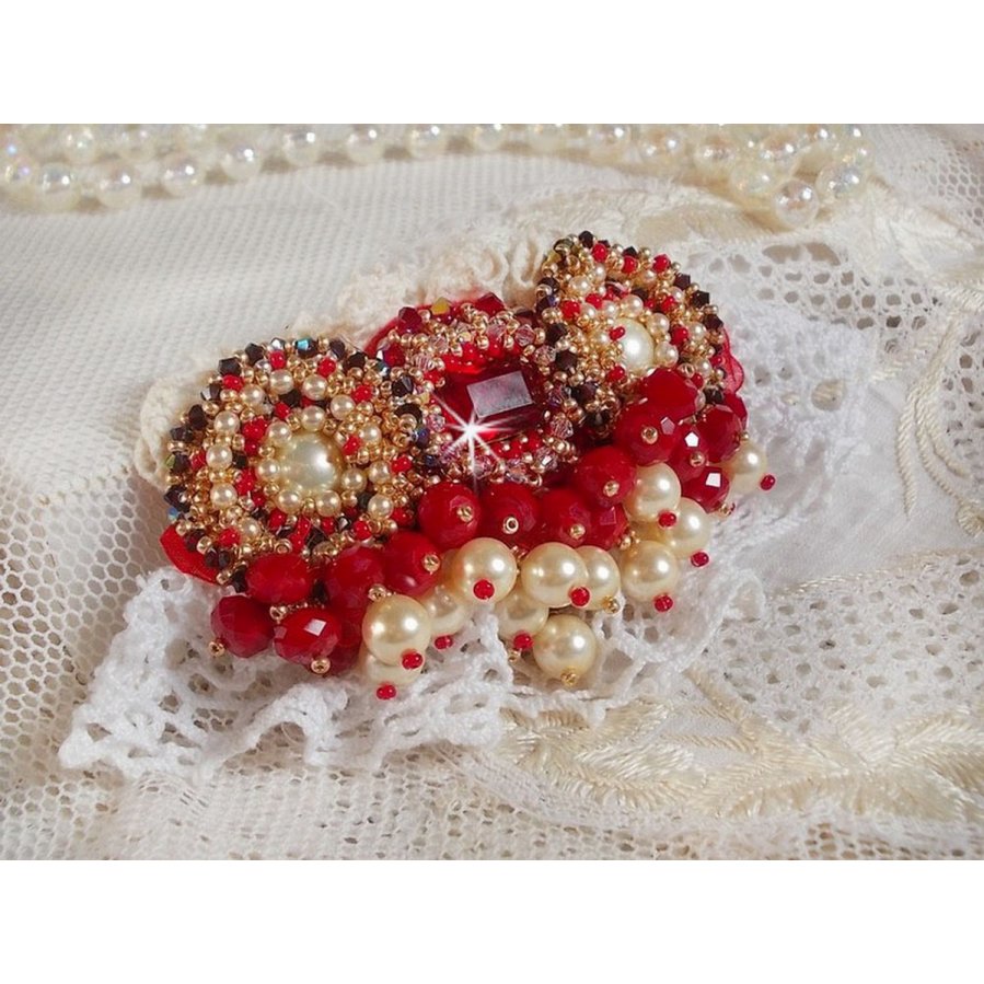 Ruby brooch embroidered with a 1960's bohemian glass cabochon, pearls, Swarovski crystals and seed beads