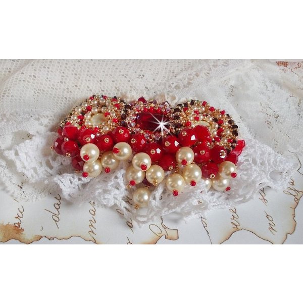 Ruby brooch embroidered with a 1960's bohemian glass cabochon, pearls, Swarovski crystals and seed beads