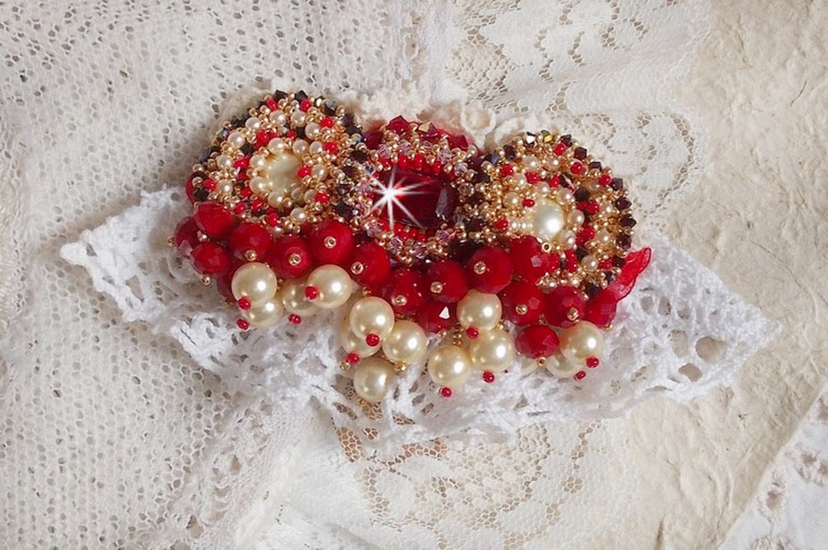 Ruby brooch embroidered with a 1960's bohemian glass cabochon, pearls, Swarovski crystals and seed beads