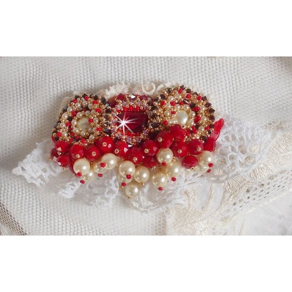 Ruby brooch embroidered with a 1960's bohemian glass cabochon, pearls, Swarovski crystals and seed beads