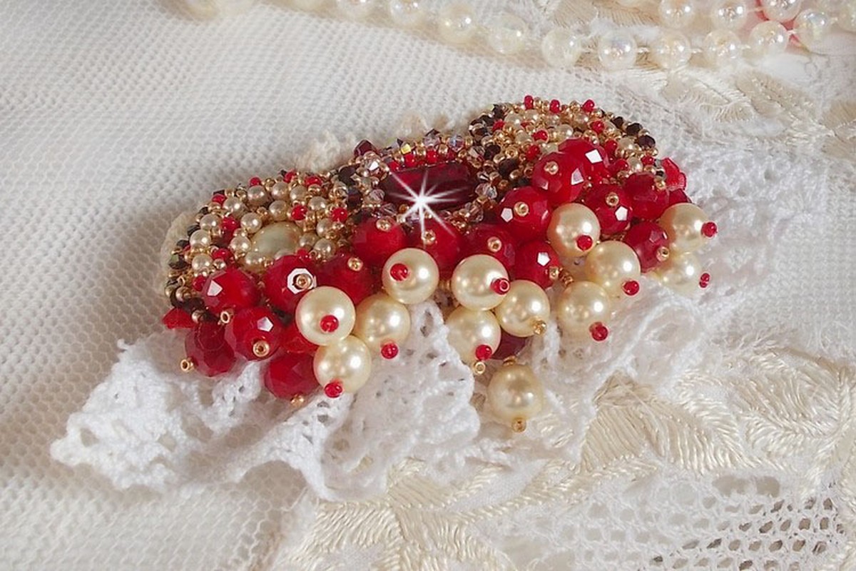 Ruby brooch embroidered with a 1960's bohemian glass cabochon, pearls, Swarovski crystals and seed beads