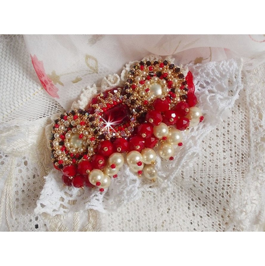 Ruby brooch embroidered with a 1960's bohemian glass cabochon, pearls, Swarovski crystals and seed beads