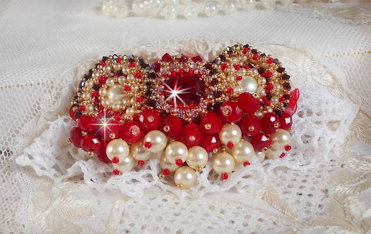 Ruby brooch embroidered with a 1960's bohemian glass cabochon, pearls, Swarovski crystals and seed beads