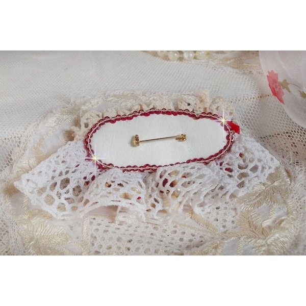 Ruby brooch embroidered with a 1960's bohemian glass cabochon, pearls, Swarovski crystals and seed beads