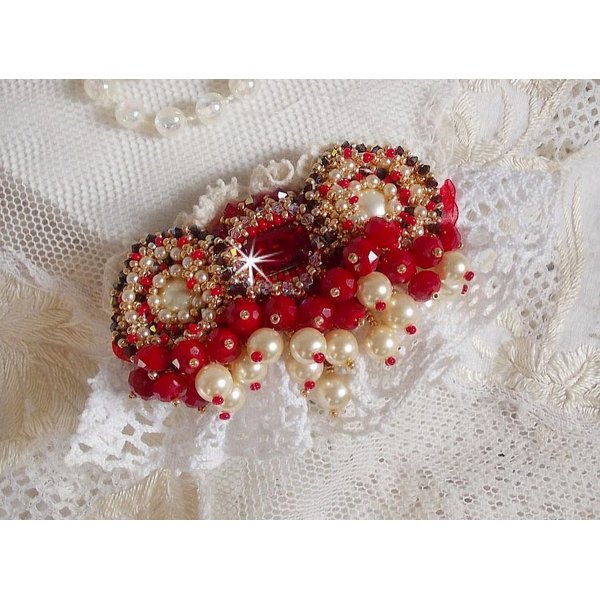 Ruby brooch embroidered with a 1960's bohemian glass cabochon, pearls, Swarovski crystals and seed beads