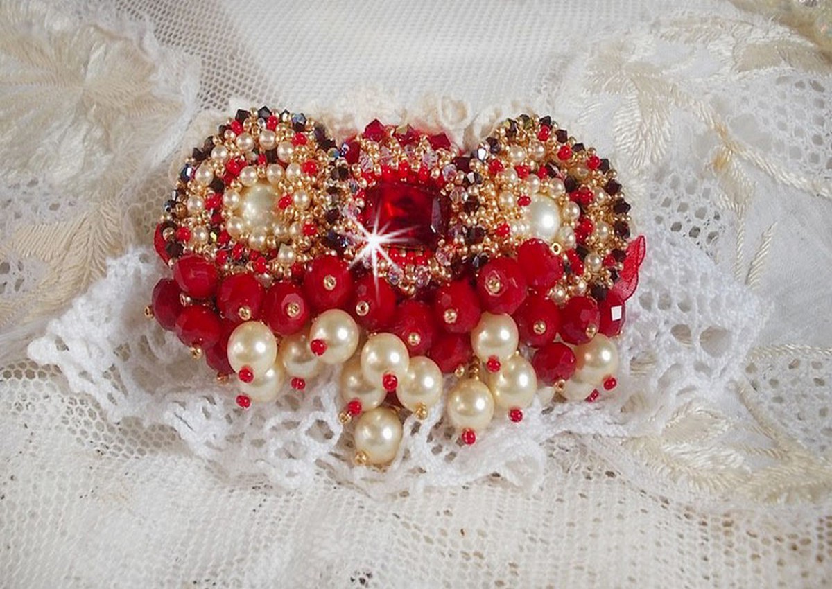 Ruby brooch embroidered with a 1960's bohemian glass cabochon, pearls, Swarovski crystals and seed beads