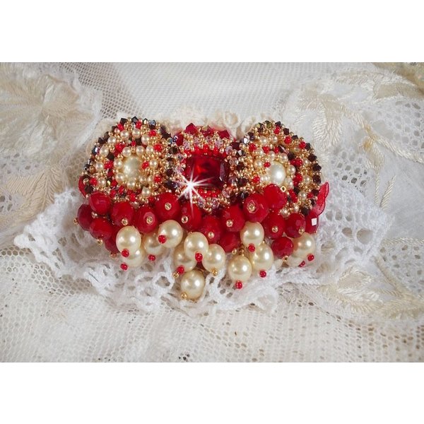 Ruby brooch embroidered with a 1960's bohemian glass cabochon, pearls, Swarovski crystals and seed beads
