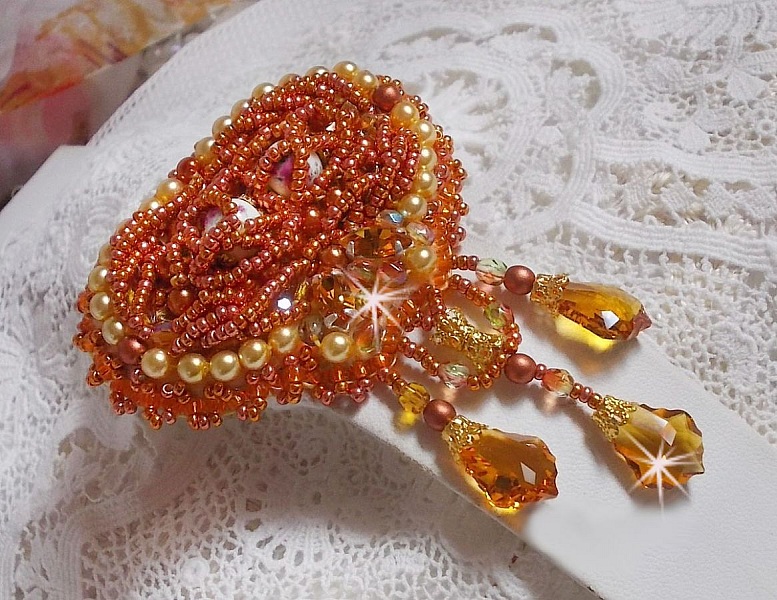Rumba brooch embroidered with Swarovski crystals, rhinestones, Tangerine navettes, round beads and seed beads