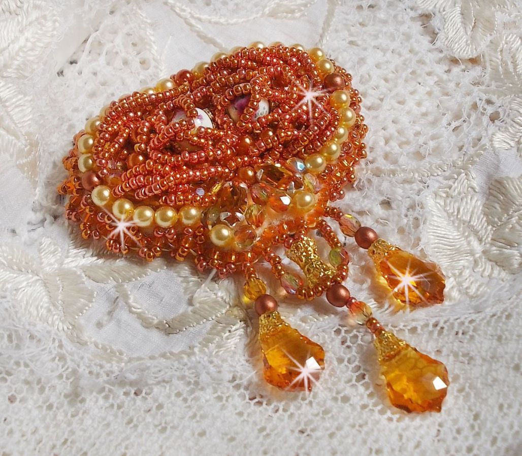 Rumba brooch embroidered with Swarovski crystals, rhinestones, Tangerine navettes, round beads and seed beads