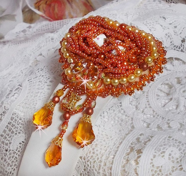 Rumba brooch embroidered with Swarovski crystals, rhinestones, Tangerine navettes, round beads and seed beads