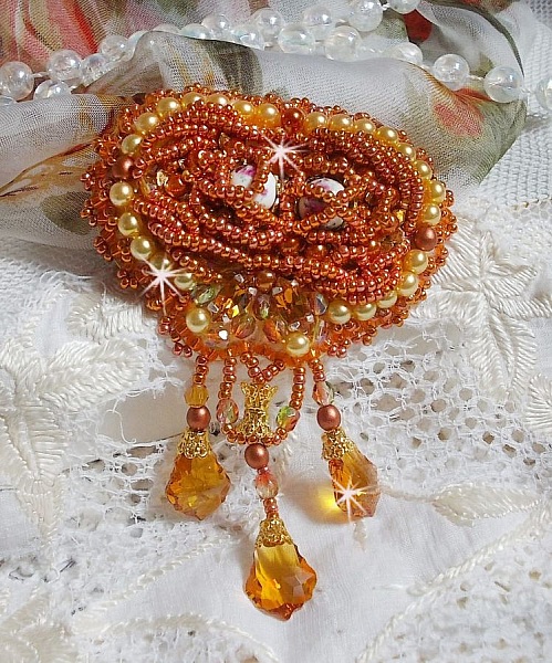 Rumba brooch embroidered with Swarovski crystals, rhinestones, Tangerine navettes, round beads and seed beads
