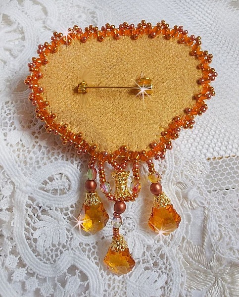 Rumba brooch embroidered with Swarovski crystals, rhinestones, Tangerine navettes, round beads and seed beads