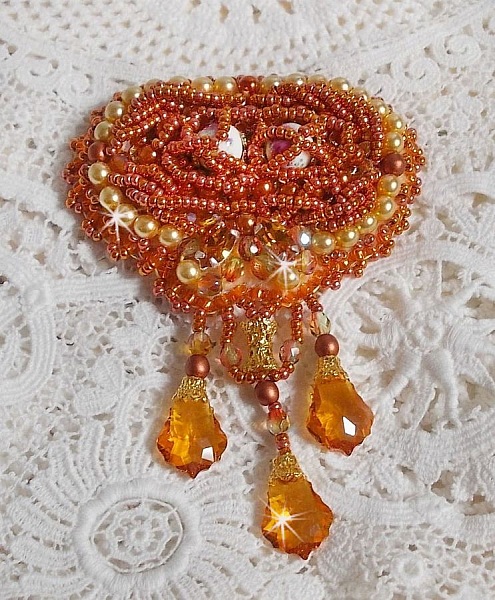Rumba brooch embroidered with Swarovski crystals, rhinestones, Tangerine navettes, round beads and seed beads