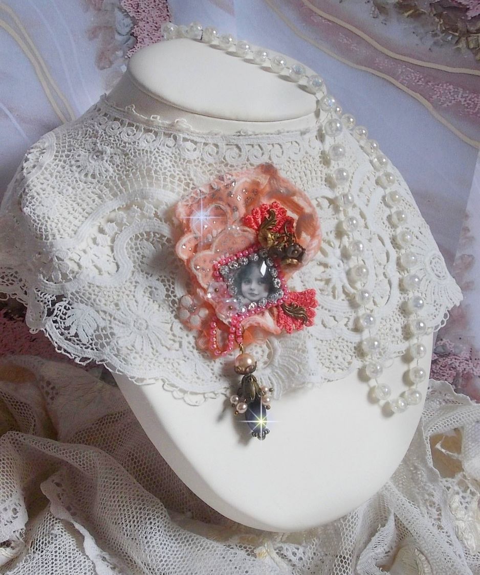 Rustic Rose brooch created with a cabochon representing a smiling girl, rhinestone and pink lace, crystals, glass beads and various accessories