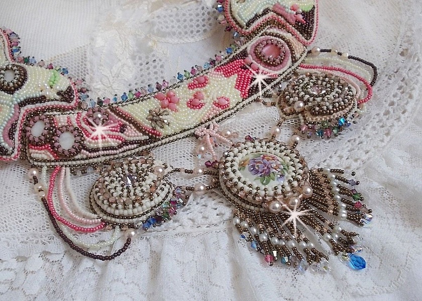 Arc-En-Ciel Haute-Couture necklace embroidered with a Limoge porcelain cabochon, Swarovski crystals and pearls. 