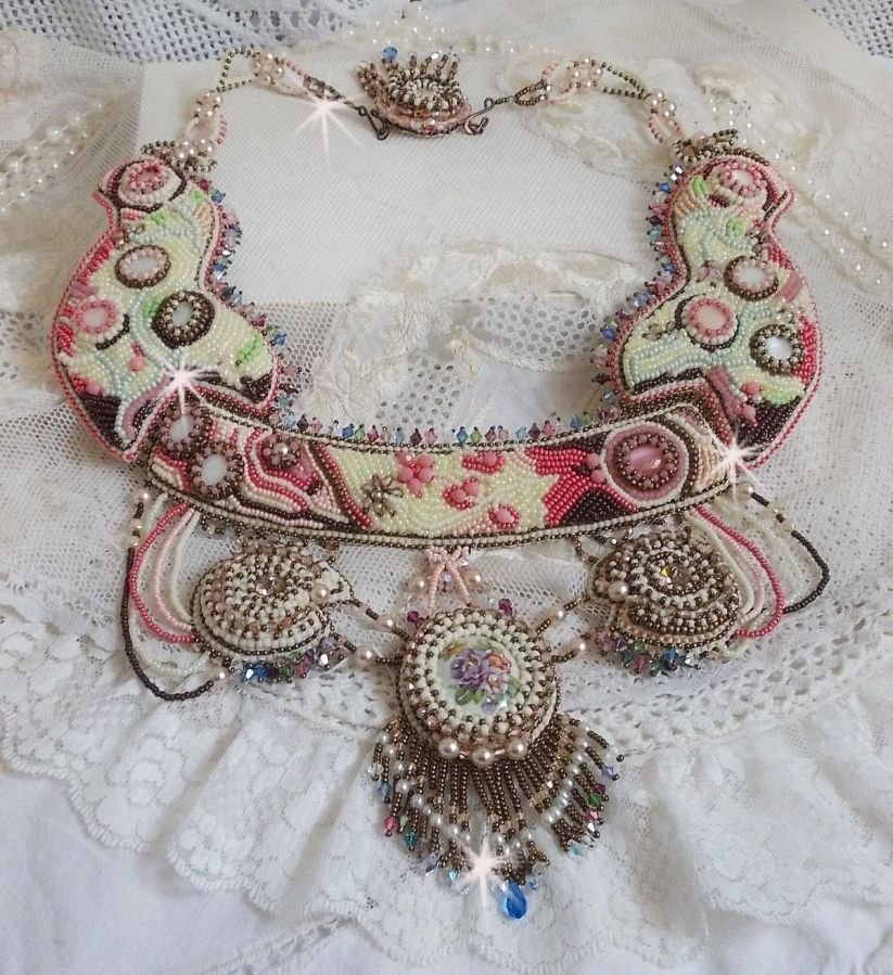 Arc-En-Ciel Haute-Couture necklace embroidered with a Limoge porcelain cabochon, Swarovski crystals and pearls. 