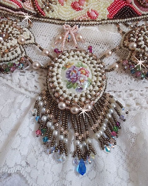 Arc-En-Ciel Haute-Couture necklace embroidered with a Limoge porcelain cabochon, Swarovski crystals and pearls. 