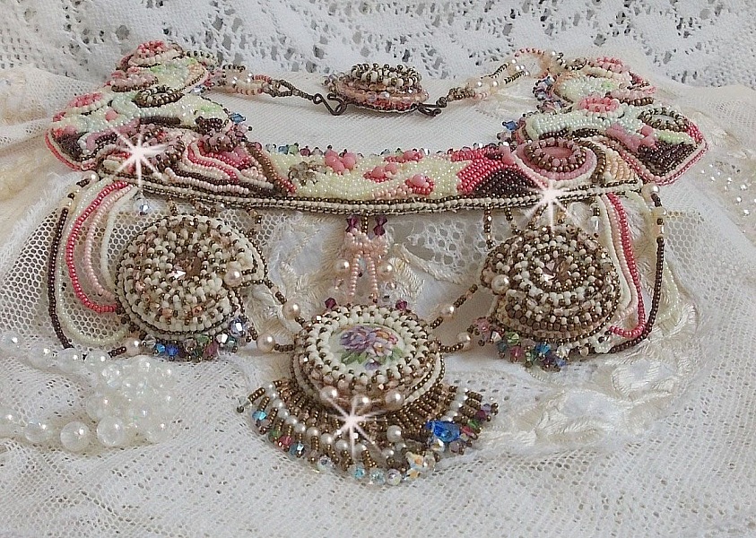Arc-En-Ciel Haute-Couture necklace embroidered with a Limoge porcelain cabochon, Swarovski crystals and pearls. 