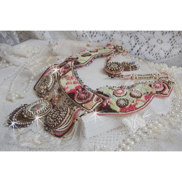 Arc-En-Ciel Haute-Couture necklace embroidered with a Limoge porcelain cabochon, Swarovski crystals and pearls. 