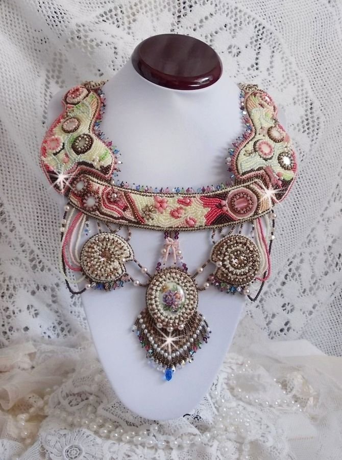 Arc-En-Ciel Haute-Couture necklace embroidered with a Limoge porcelain cabochon, Swarovski crystals and pearls. 