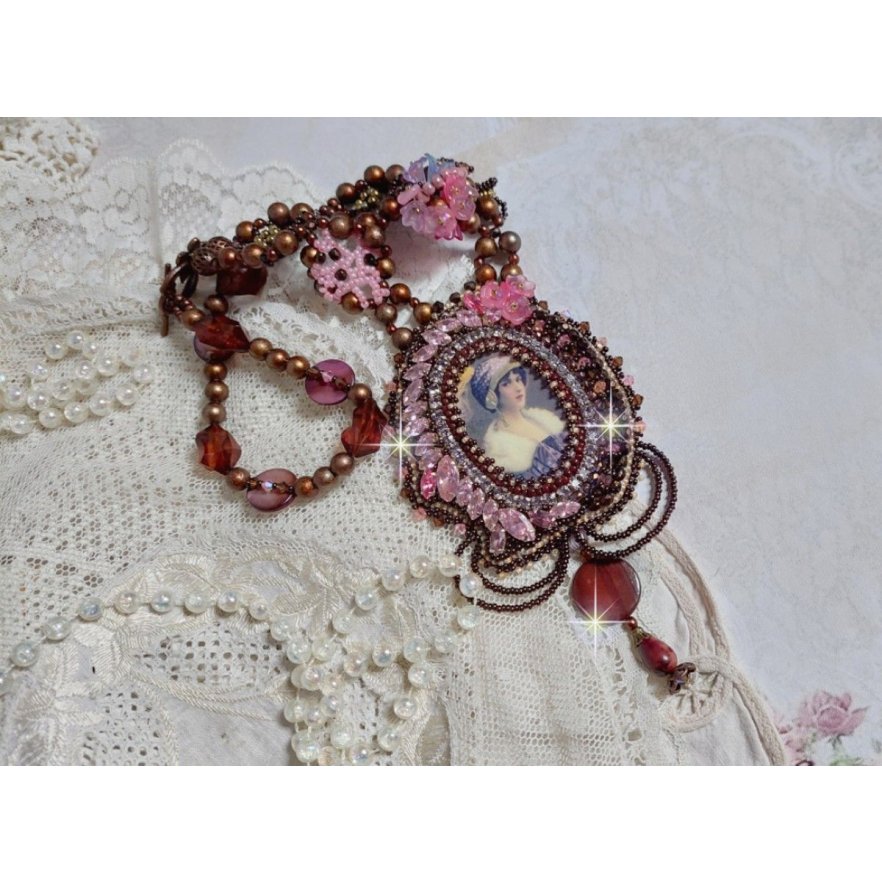 Belle Romance Haute-Couture necklace embroidered with a cabochon portrait of a woman in a hat with crystals, satin pearls, golden round pearls, mother of pearl cabochons and 