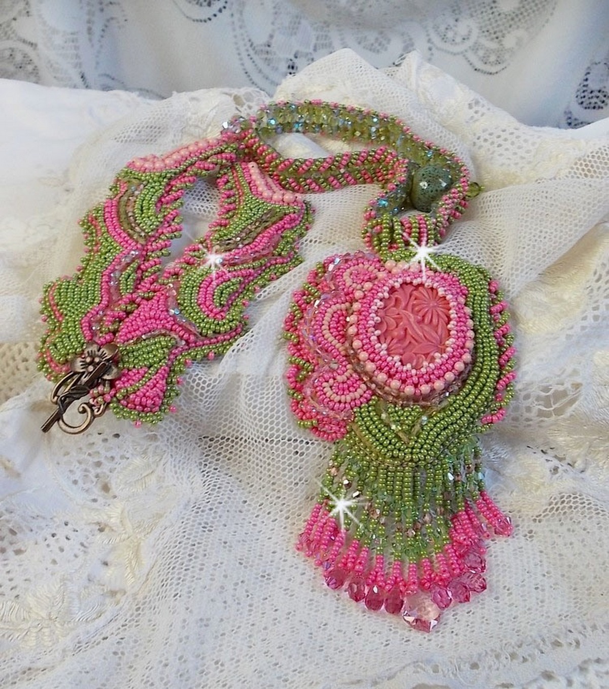 Miss Lady necklace embroidered with green and pink seed beads and a resin cabochon