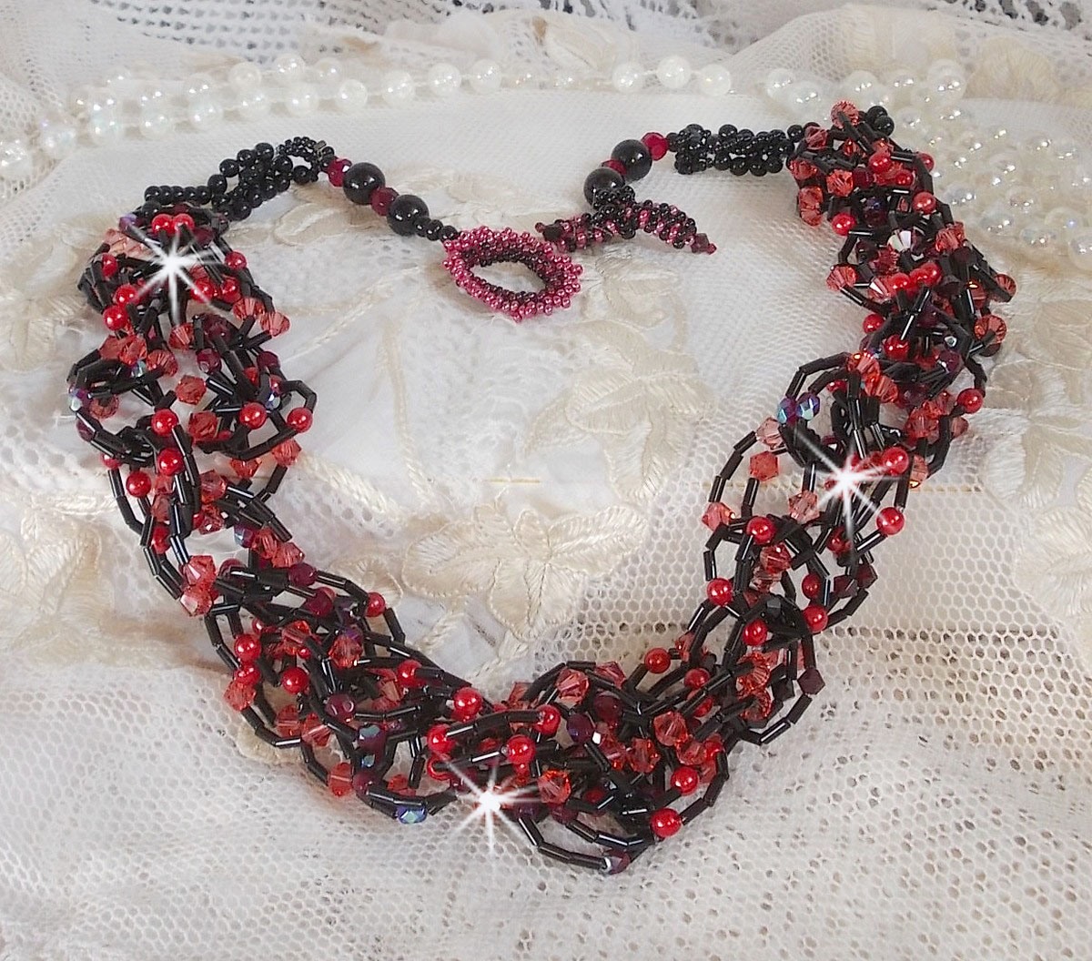 Feeling necklace mounted with tube seed beads, Swarovski crystals and facets