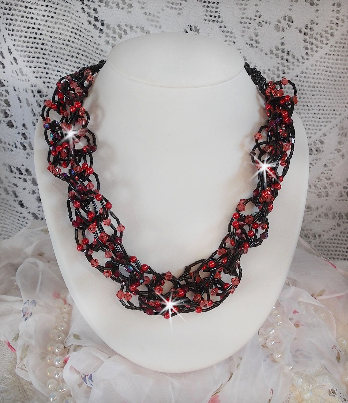 Feeling necklace mounted with tube seed beads, Swarovski crystals and facets