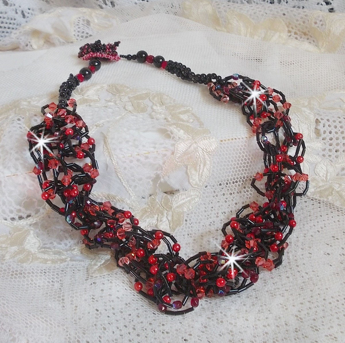 Feeling necklace mounted with tube seed beads, Swarovski crystals and facets