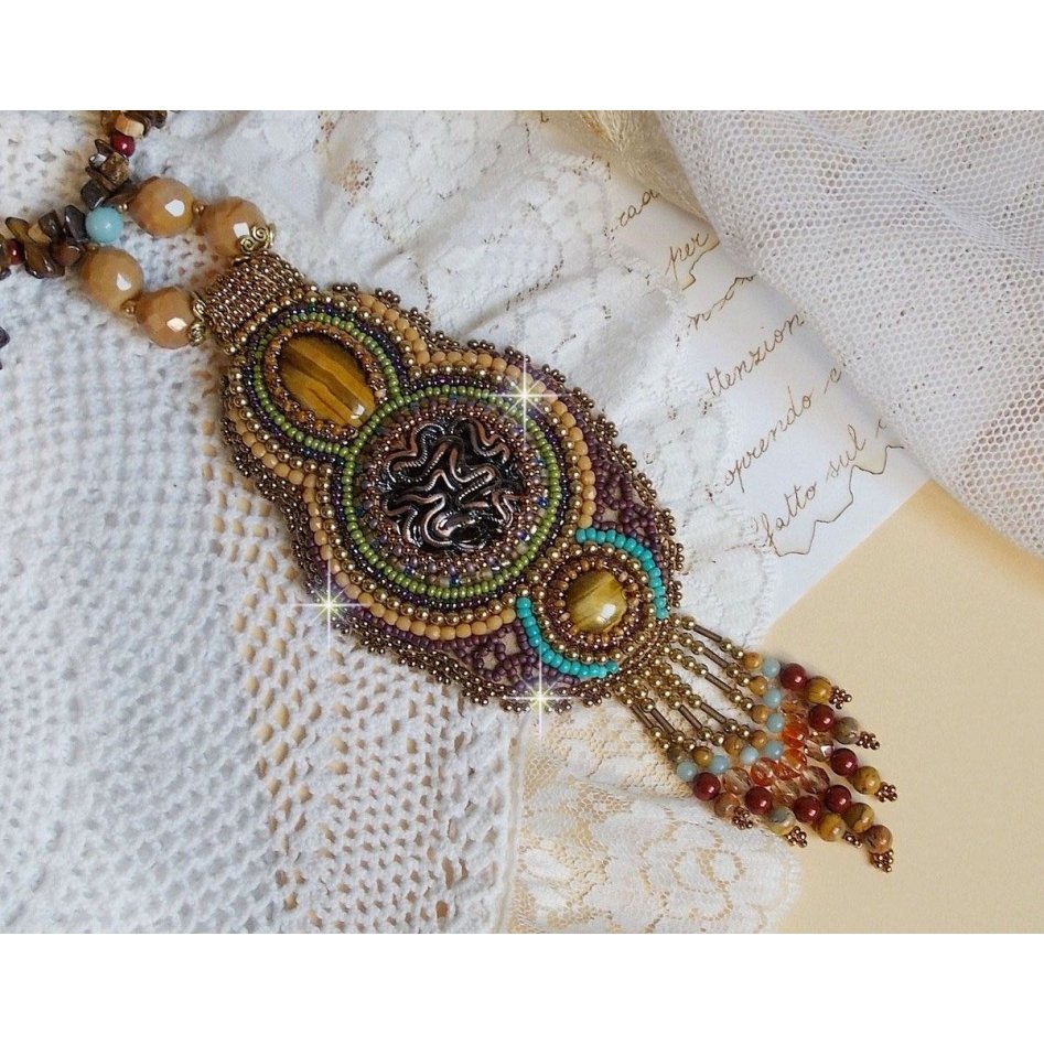 Fauve pendant necklace embroidered with several tiger eyes, Haute-Couture style