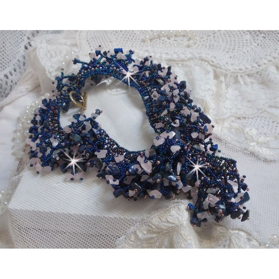 Coral flower necklace with seed beads and semi-precious pearls such as Quartz, Sodalite and Lapis Lazuli.