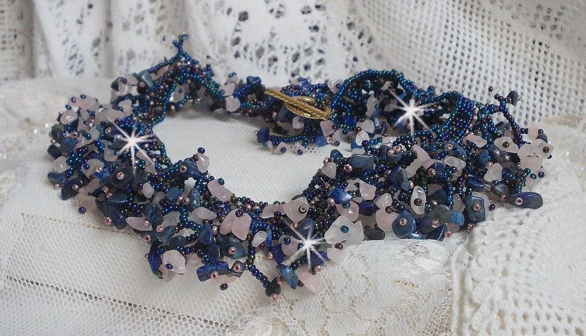 Coral flower necklace with seed beads and semi-precious pearls such as Quartz, Sodalite and Lapis Lazuli.