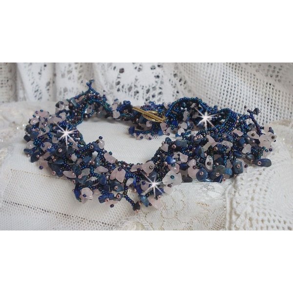 Coral flower necklace with seed beads and semi-precious pearls such as Quartz, Sodalite and Lapis Lazuli.