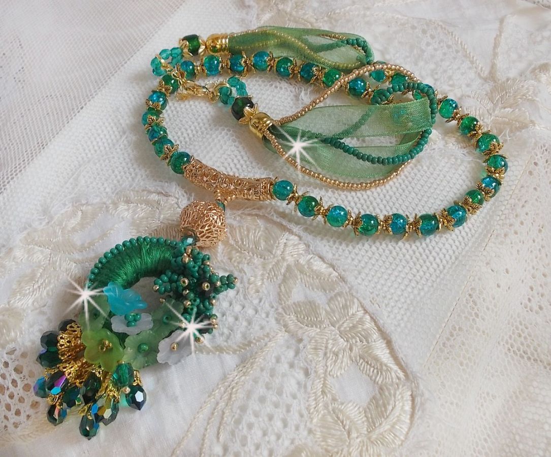 Green Iris necklace embroidered with emerald green DMC cotton, Swarovski crystals, resin beads and seed beads