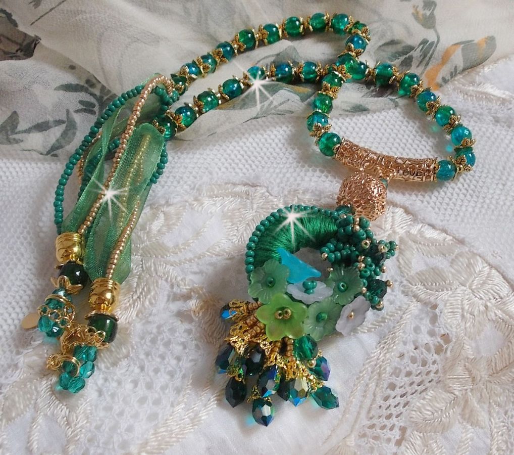 Green Iris necklace embroidered with emerald green DMC cotton, Swarovski crystals, resin beads and seed beads