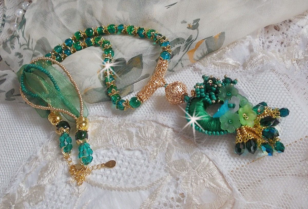 Green Iris necklace embroidered with emerald green DMC cotton, Swarovski crystals, resin beads and seed beads