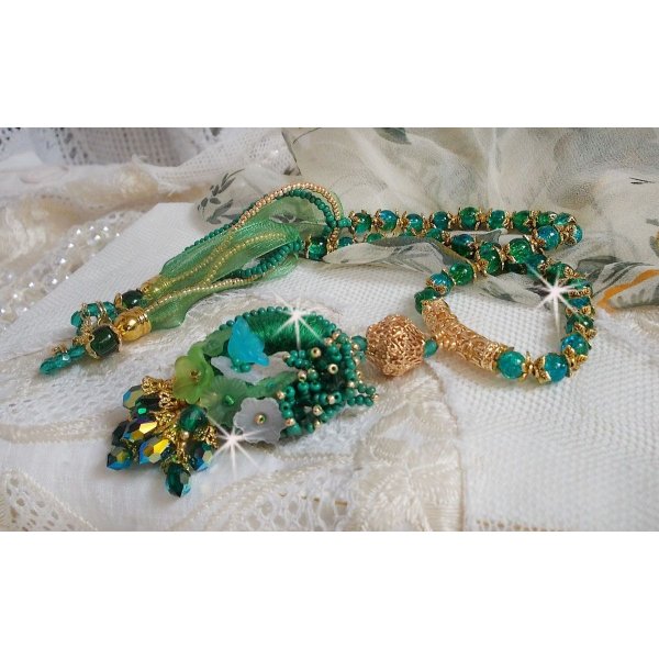 Green Iris necklace embroidered with emerald green DMC cotton, Swarovski crystals, resin beads and seed beads