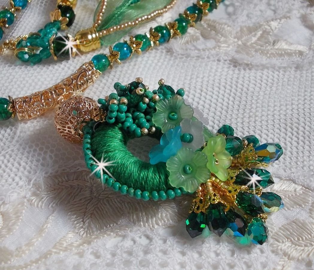 Green Iris necklace embroidered with emerald green DMC cotton, Swarovski crystals, resin beads and seed beads