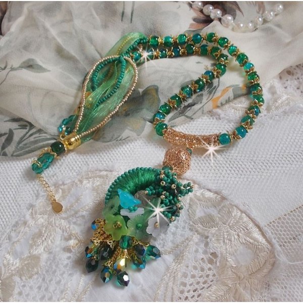 Green Iris necklace embroidered with emerald green DMC cotton, Swarovski crystals, resin beads and seed beads