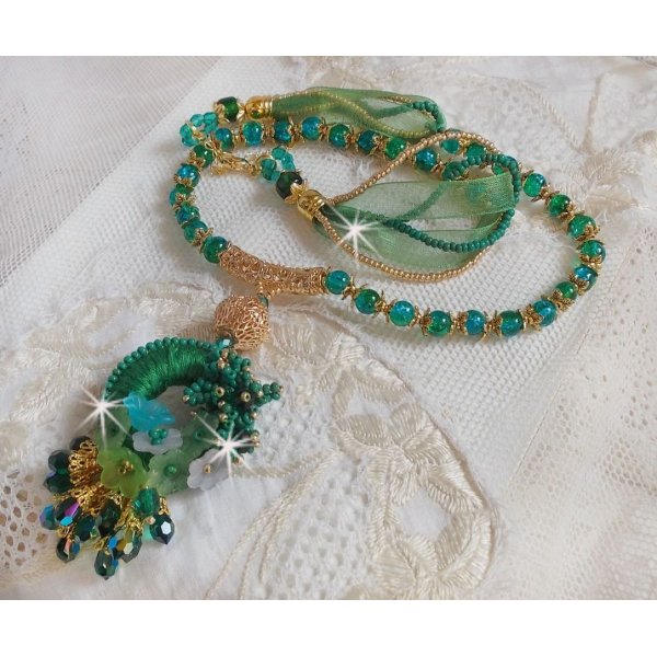 Green Iris necklace embroidered with emerald green DMC cotton, Swarovski crystals, resin beads and seed beads