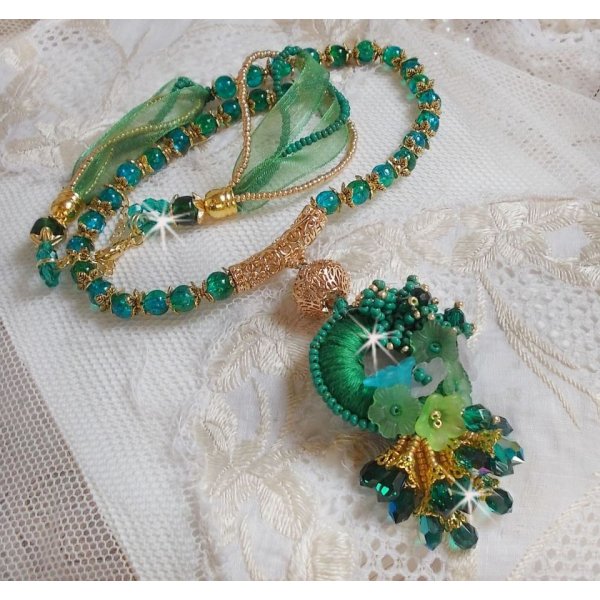 Green Iris necklace embroidered with emerald green DMC cotton, Swarovski crystals, resin beads and seed beads