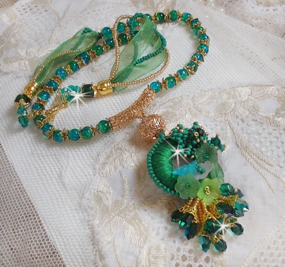 Green Iris necklace embroidered with emerald green DMC cotton, Swarovski crystals, resin beads and seed beads