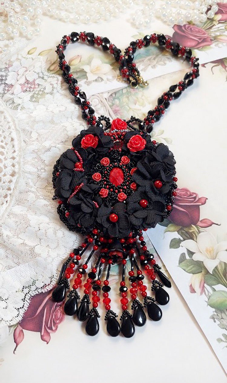 Midnight in Paris necklace embroidered with Swarovski crystals, resin roses, rocailles and black daggers