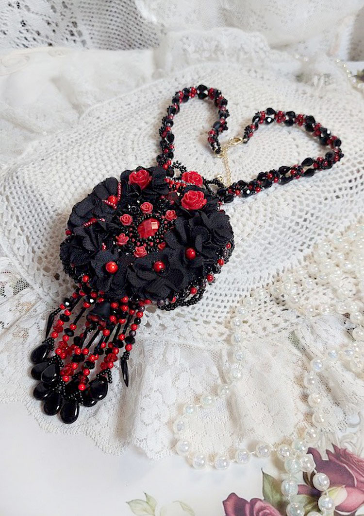 Midnight in Paris necklace embroidered with Swarovski crystals, resin roses, rocailles and black daggers