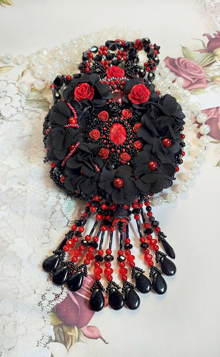 Midnight in Paris necklace embroidered with Swarovski crystals, resin roses, rocailles and black daggers