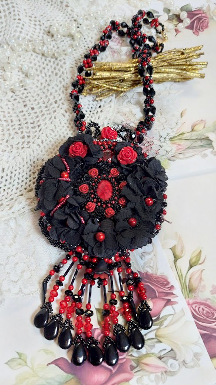 Midnight in Paris necklace embroidered with Swarovski crystals, resin roses, rocailles and black daggers