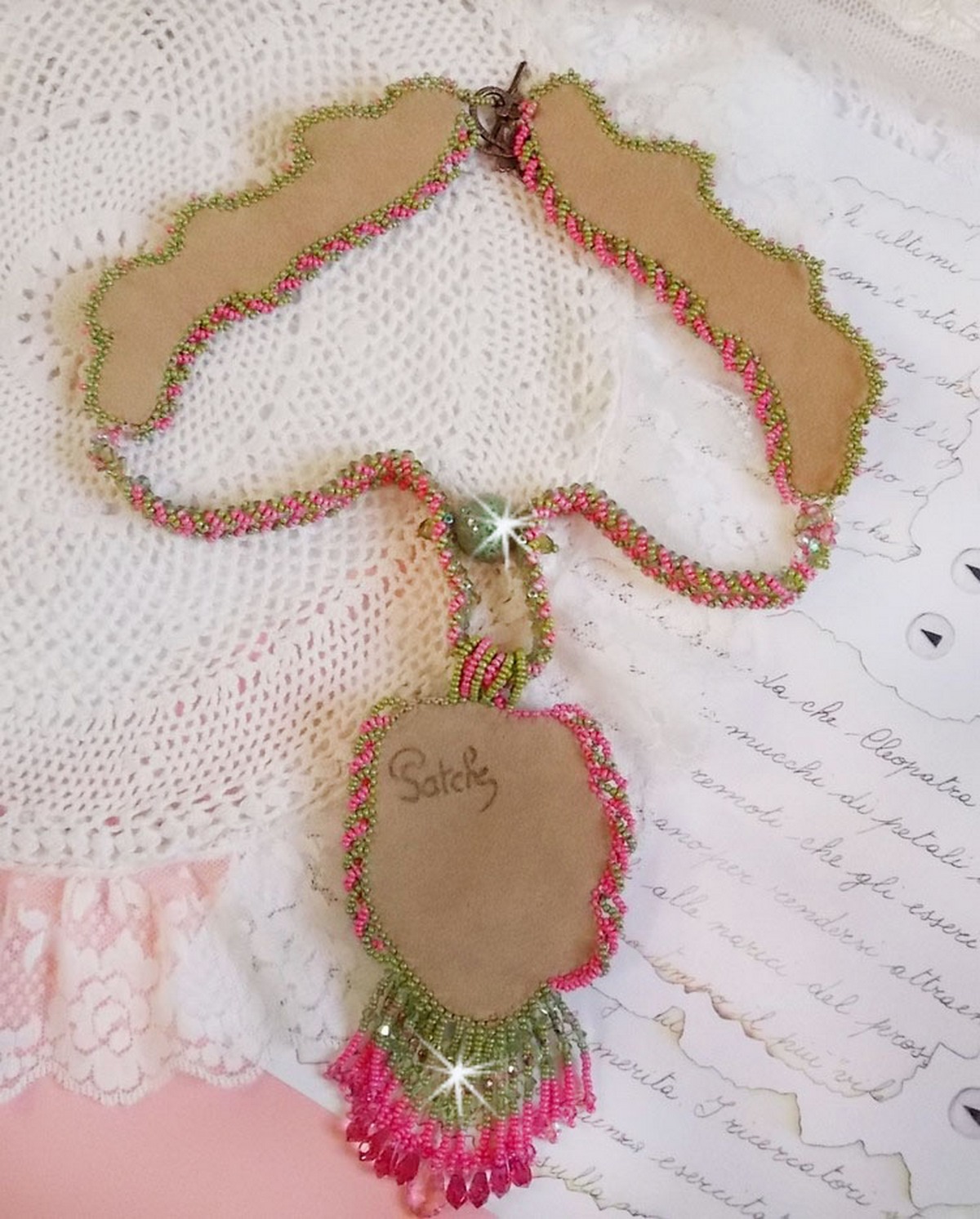 Miss Lady necklace embroidered with green and pink seed beads and a resin cabochon