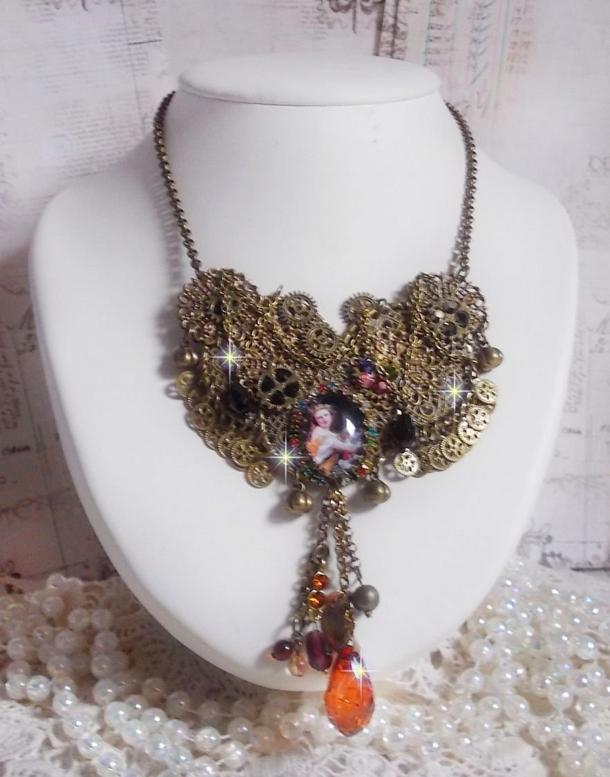 Necklace Mes Passions Broc's created a woman with golden hair with flowers, accessories of Bronze color, charms of crystals and a rhinestone chain