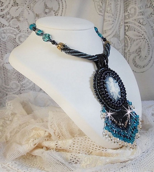 Angelot pendant necklace embroidered with an acrylic Angel, Swarovski crystal spinning tops and Japanese seed beads